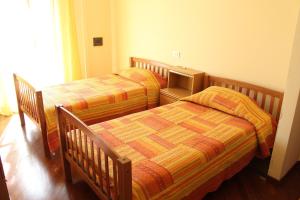 Кровать или кровати в номере Dora apartment