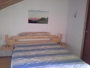 Una cama o camas en una habitación de Apartments INES 1