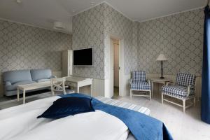 Postel nebo postele na pokoji v ubytování Hotel Bretagne + 34 fotografií