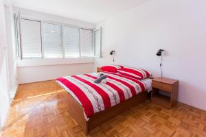 Кровать или кровати в номере Apartment Tamaris