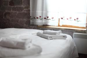 Postel nebo postele na pokoji v ubytování Kidalyo Hotel - Special Category