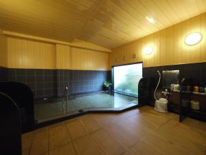 Phòng tắm tại Hotel Route-Inn Iwakiizumi Ekimae