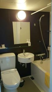 Koupelna v ubytování Nezame Hotel + 18 fotografií