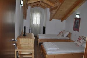 A bed or beds in a room at Hotel Marub