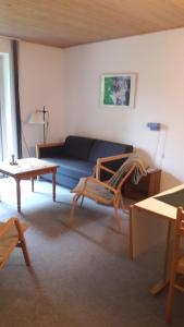 Posezení v ubytování Lyngbjerggaard Ferieboliger - B&B
