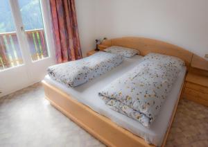 Postel nebo postele na pokoji v ubytování Albergo Somont
