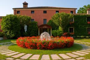 Vonkajšia záhrada v ubytovaní Relais Villabella Hotel