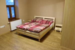 Posteľ alebo postele v izbe v ubytovaní Ubytovanie Tri ruže