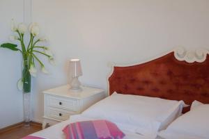 Postel nebo postele na pokoji v ubytování Apartments Judita
