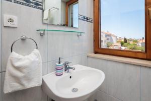 Koupelna v ubytování Apartments Judita