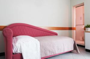 Postel nebo postele na pokoji v ubytování Hotel Junior