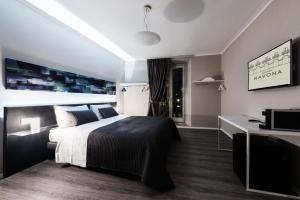 Postel nebo postele na pokoji v ubytování Residenza Navona Verona