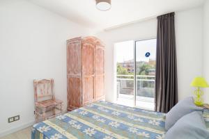 Cama ou camas em um quarto em Apartamentos InterSalou Priorat