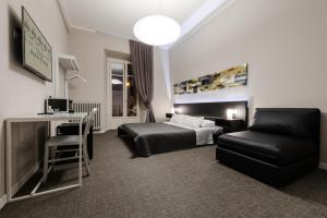 Postel nebo postele na pokoji v ubytování Residenza Navona Verona