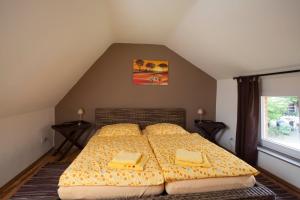 Postel nebo postele na pokoji v ubytování Ferienhaus Nr. 1