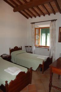Ένα ή περισσότερα κρεβάτια σε δωμάτιο στο Marinho