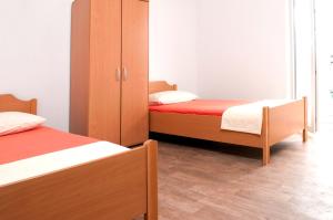 Postel nebo postele na pokoji v ubytování Apartment Kraljević