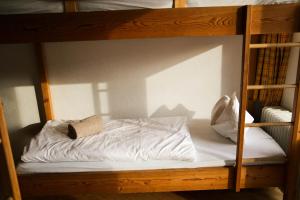Voodi või voodid majutusasutuse Hotel Schwarzer Adler Sillian toas