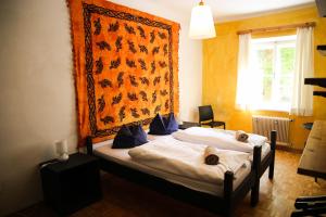 Voodi või voodid majutusasutuse Hotel Schwarzer Adler Sillian toas