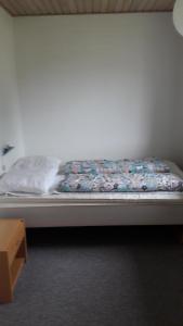 Postel nebo postele na pokoji v ubytování Lyngbjerggaard Ferieboliger - B&B