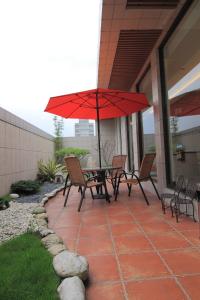 Patio nebo venkovní prostory v ubytování Green Life Spa Hot Spring Hotel