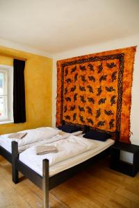 Voodi või voodid majutusasutuse Hotel Schwarzer Adler Sillian toas