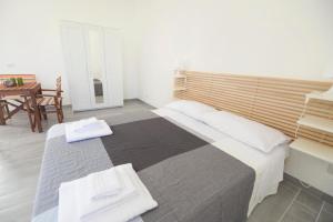 Posteľ alebo postele v izbe v ubytovaní Jardinu