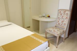 Postel nebo postele na pokoji v ubytování Hotel Europa