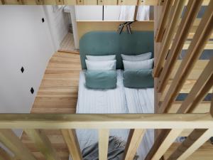 Postel nebo postele na pokoji v ubytování Ohboy Hotell