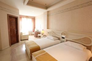 Postel nebo postele na pokoji v ubytování Hotel Europa