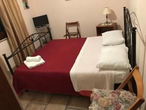 Postel nebo postele na pokoji v ubytování B&B Porticella