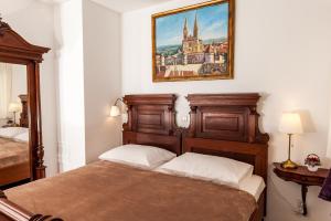 Postel nebo postele na pokoji v ubytování Main Square penthouse