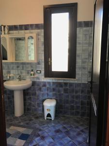 Koupelna v ubytování B&B Porticella + 17 fotografií