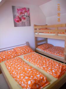 A bed or beds in a room at Nagelj 1