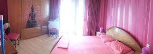 Ένα ή περισσότερα κρεβάτια σε δωμάτιο στο Ano Poli Thessaloniki