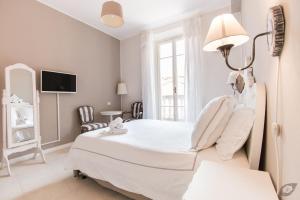 Posteľ alebo postele v izbe v ubytovaní B&B La Sosta degli Artisti