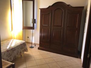 Postel nebo postele na pokoji v ubytování B&B Porticella