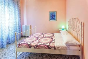 En eller flere senge i et værelse på Residenza Orizzonte Blu