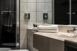 Um banheiro em Mercure Frankfurt City Messe
