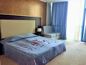 Postel nebo postele na pokoji v ubytování Hotel Primorsko Del Sol