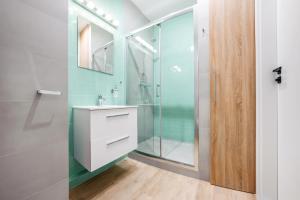 Kúpeľňa v ubytovaní Apartamenty Sun & Snow Gdańsk Bursztynowa