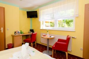 TV a/nebo společenská místnost v ubytování 1a Hotel Steiner