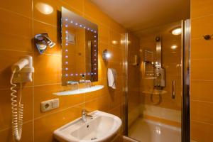 Koupelna v ubytování 1a Hotel Steiner