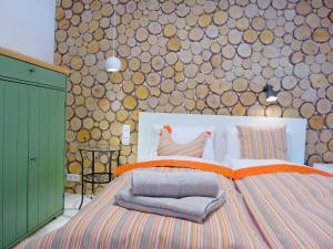 En eller flere senge i et værelse på Wellness Apartamenty Złoty Widok