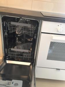 Kuchyň nebo kuchyňský kout v ubytování Apartments Ema