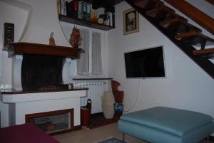 Televízia a/alebo spoločenská miestnosť v ubytovaní Art apartment
