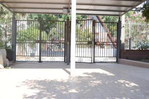 an entrance to a building with an iron gate at Stefy Home in Catania