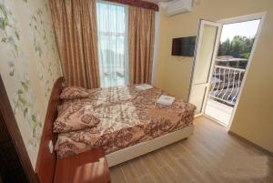 Cama o camas de una habitación en Malahit 2