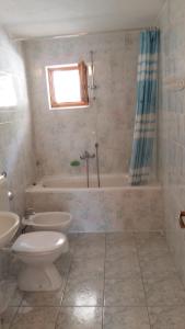 Kúpeľňa v ubytovaní Apartmani Ivanka