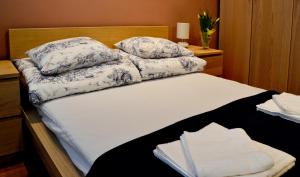 Ένα ή περισσότερα κρεβάτια σε δωμάτιο στο 777 Apartaments